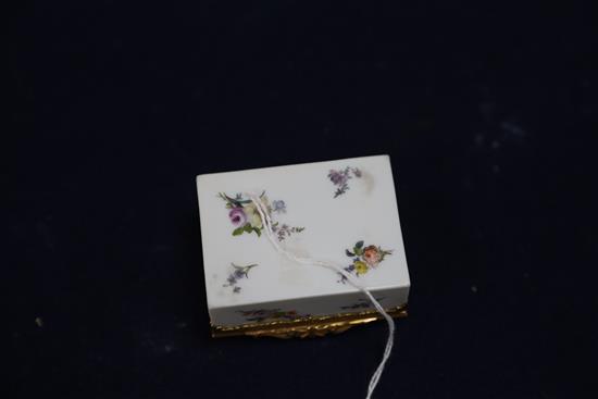 A Meissen gold mounted table snuff box, mid 18th century, W. 6.8cm, lid cracked